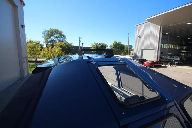 Slide: The Image of 2025 Weldcraft 240 Maverick DV boat roof detail in outdoor setting. - 32