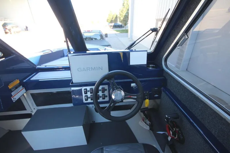 Slide: The Image of 2025 Weldcraft 240 Maverick DV boat cockpit with Garmin navigation system. - 41