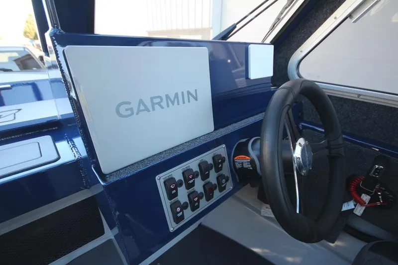Slide: The Image of 2025 Weldcraft 240 Maverick DV boat dashboard with Garmin navigation system. - 43