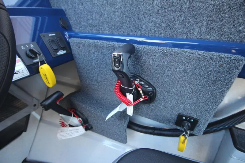 Slide: The Image of 2025 Weldcraft 240 Maverick DV boat controls and dashboard details. - 45