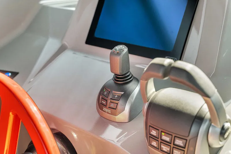 Slide: The Image of Control panel of 2021 Vanquish Yachts VQ 45 with joystick and screen. - 21