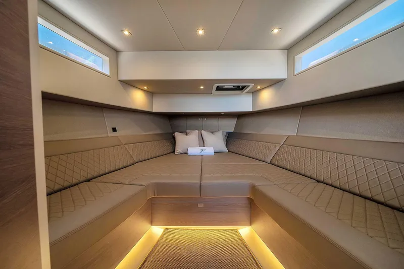 Slide: The Image of Luxurious interior of 2021 Vanquish Yachts VQ 45 with elegant seating and ambient lighting. - 37