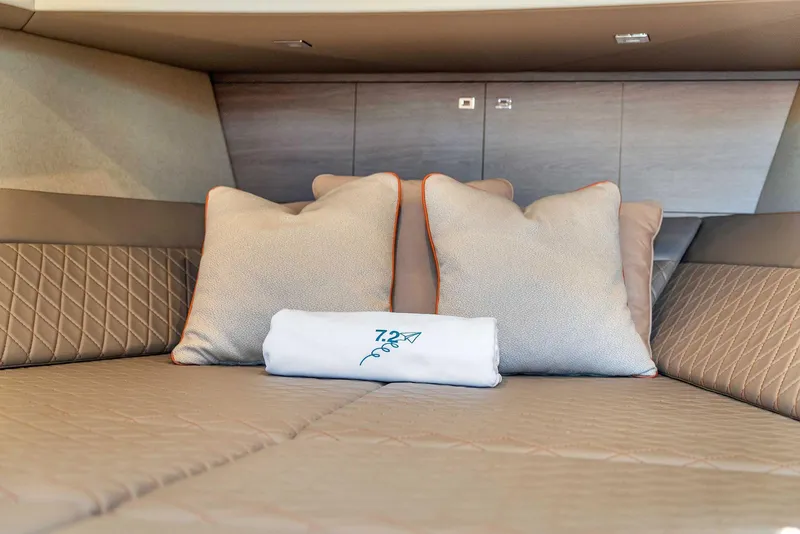 Slide: The Image of Luxurious interior of 2021 Vanquish Yachts VQ 45 with plush pillows and elegant bedding. - 41