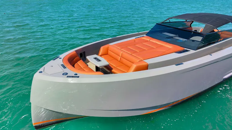 Slide: The Image of Vanquish Yachts VQ 45, 2021 model, luxury yacht on turquoise water. - 7