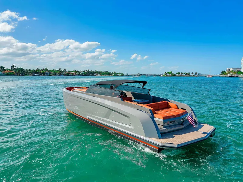 Slide: The Image of Vanquish Yachts VQ 45, 2021 model, cruising on clear blue waters under a sunny sky. - 19