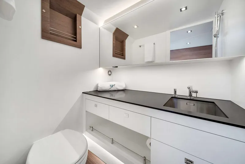 Slide: The Image of Luxurious bathroom interior of 2021 Vanquish Yachts VQ 45, featuring sleek modern design. - 43