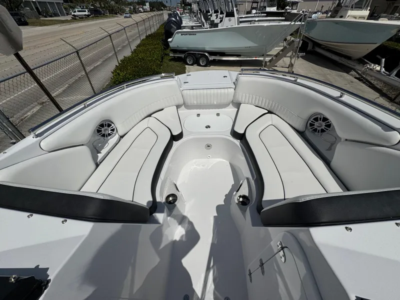 Slide: The Image of 2025 Stingray 231DC boat interior with spacious seating and modern design. - 5
