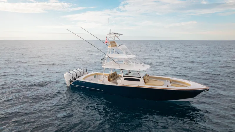 Slide: The Image of 2025 Phenom 43 yacht on open sea, featuring sleek design and powerful engines. - 4