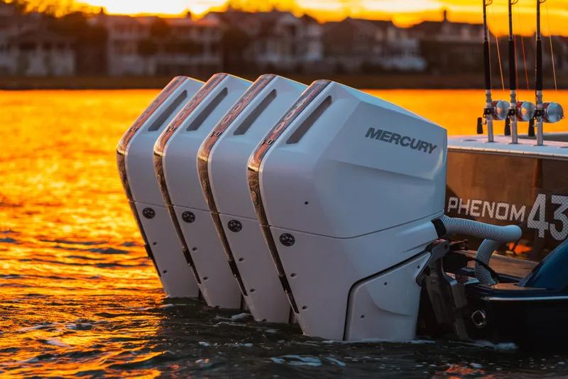 Slide: The Image of Phenom 43 boat with Mercury engines at sunset, 2025 model. - 7