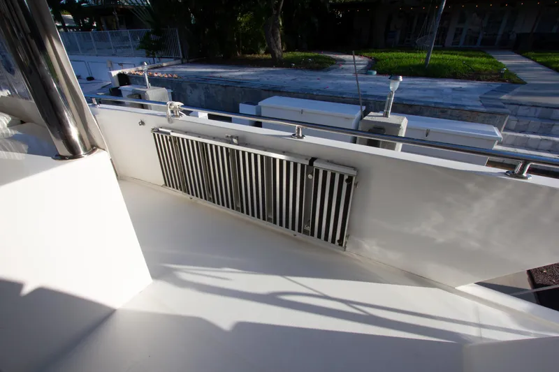 Slide: The Image of Johnson 70 Motor Yacht 1999 deck with railing and vent detail. - 7