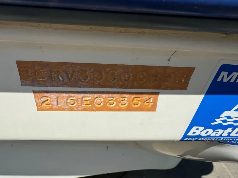 Slide: The Image of 1996 Sea Ray 215 Express Cruiser hull identification number and registration sticker. - 12