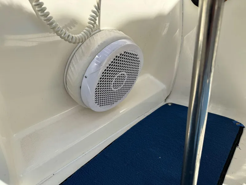 Slide: The Image of White speaker on 1996 Sea Ray 215 Express Cruiser boat interior. - 18