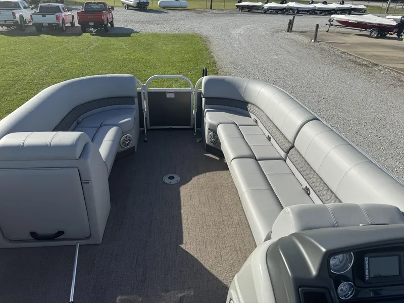 Slide: The Image of 2019 Ranger Reata 223C pontoon boat with spacious seating and modern design. - 4