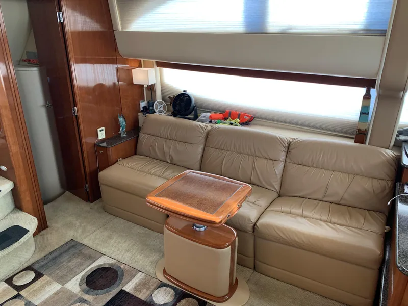 Slide: The Image of Luxurious interior of 2006 Meridian 459 Motoryacht with leather sofa and wooden accents. - 7