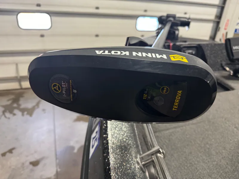 Slide: The Image of Minn Kota Terrova motor on 2022 Nitro ZV20 boat in garage setting. - 16