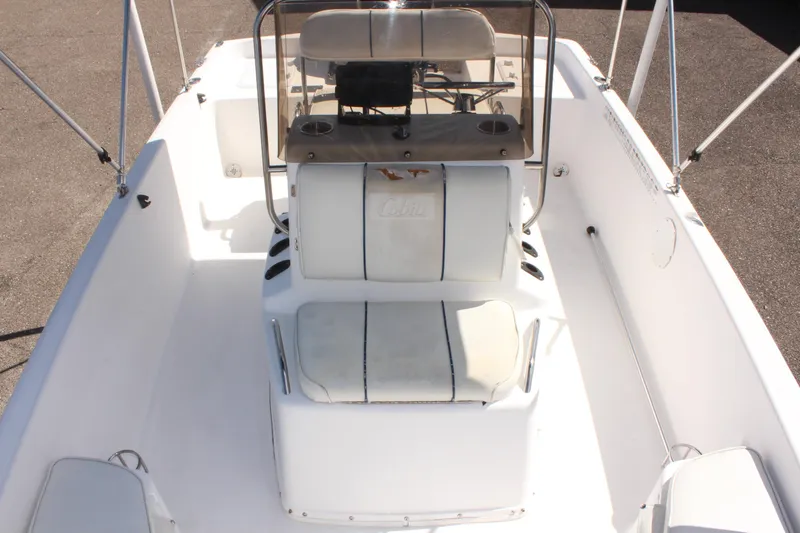 Slide: The Image of 2002 Cobia 191 Bay boat interior with seating and console. - 23
