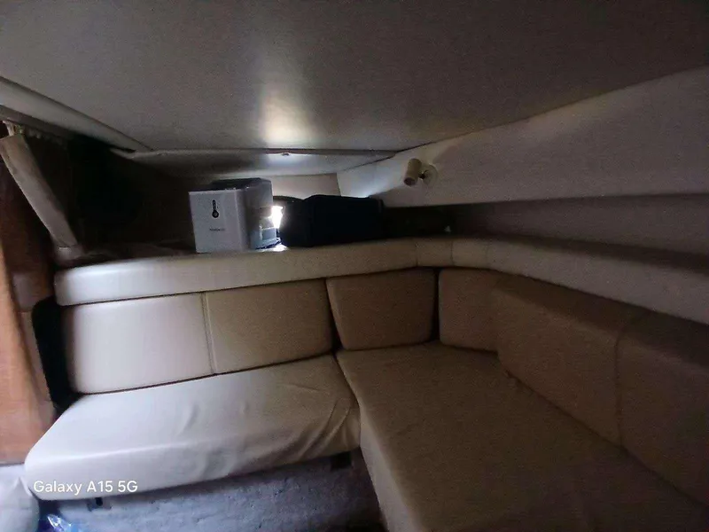 Slide: The Image of Interior cabin of 2002 Regal Commodore 3060 with beige seating. - 20