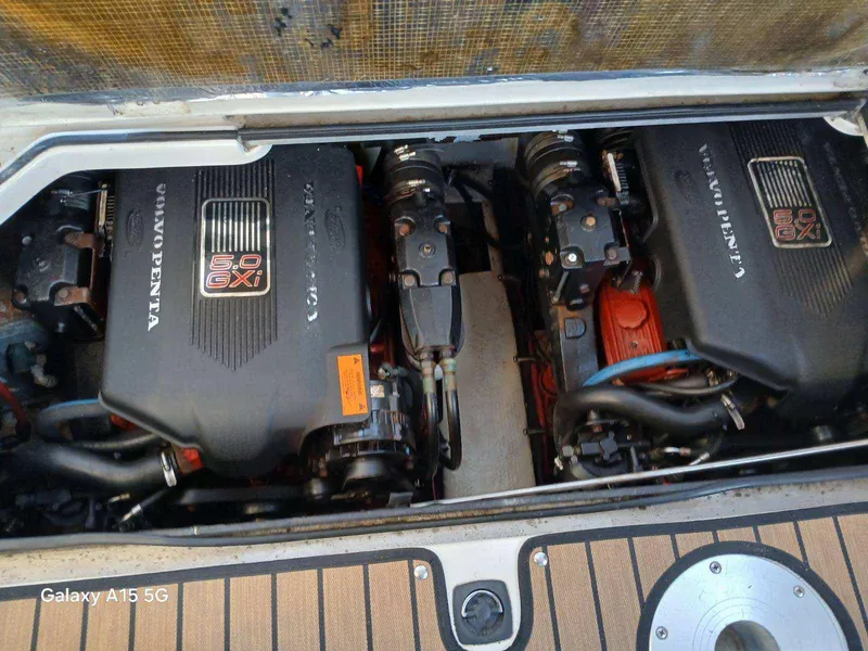 Slide: The Image of Twin Volvo Penta engines in a 2002 Regal Commodore 3060 boat. - 37