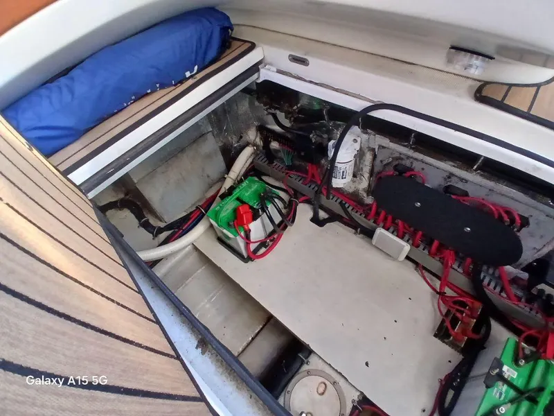 Slide: The Image of Engine compartment of 2002 Regal Commodore 3060 boat, showing wiring and components. - 38