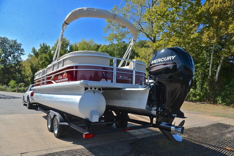 Slide: The Image of 2018 Sun Tracker Party Barge 24 DLX pontoon boat with Mercury engine on trailer. - 12