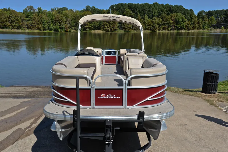 Slide: The Image of 2018 Sun Tracker Party Barge 24 DLX pontoon boat by a serene lake. - 17