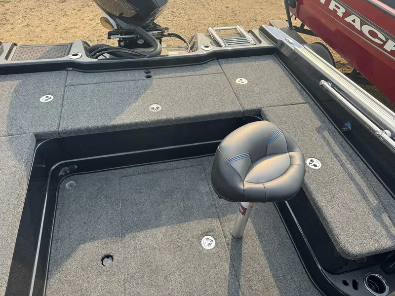 Slide: The Image of 2024 Nitro ZV20 boat deck with seating and storage compartments. - 12