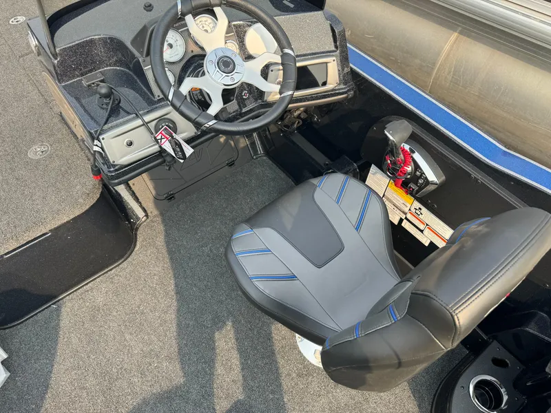 Slide: The Image of 2024 Nitro ZV20 boat interior with steering wheel and seat. - 15