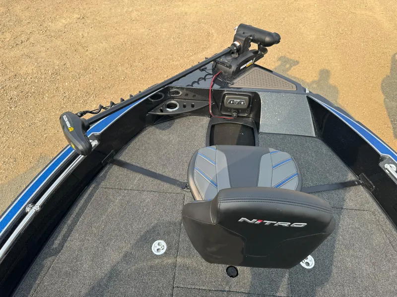 Slide: The Image of 2024 Nitro ZV20 boat interior with steering and seating. - 18