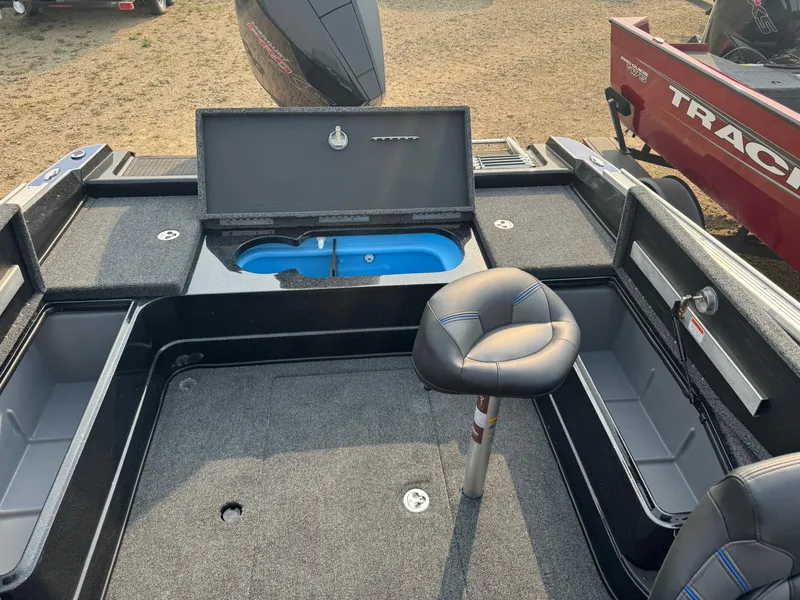 Slide: The Image of 2024 Nitro ZV20 boat interior with seating and storage compartments. - 26