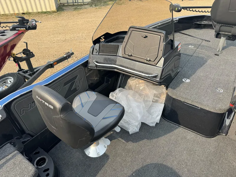 Slide: The Image of 2024 Nitro ZV20 boat interior with seating and storage compartments. - 8