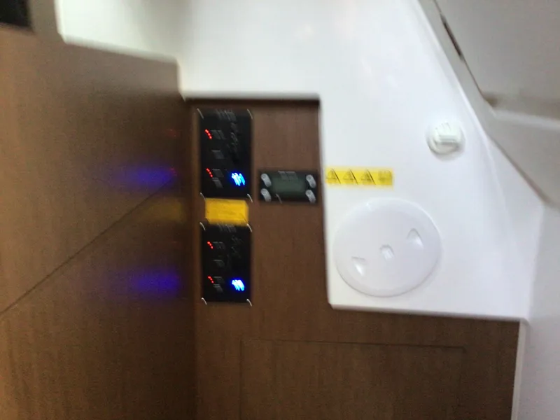 Slide: The Image of Control panel inside 2024 Beneteau Antares 11 Fly yacht, featuring modern design elements. - 14