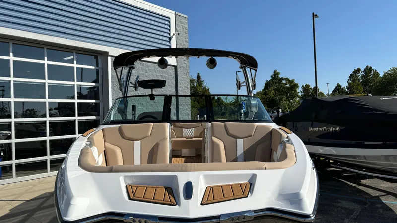 Slide: The Image of 2025 MasterCraft XT24 boat with sleek design and spacious seating. - 36