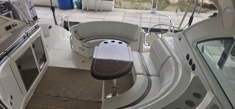 Slide: The Image of 2011 Cruisers Yachts 540 interior with seating and table. - 9