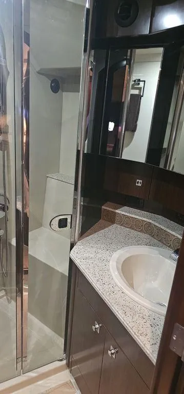 Slide: The Image of 2011 Cruisers Yachts 540 bathroom with modern sink and shower. - 16