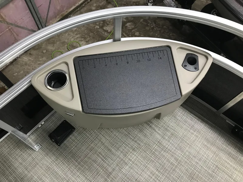 Slide: The Image of Interior view of 2025 Ranger Reata 200F boat with seating and railing. - 18