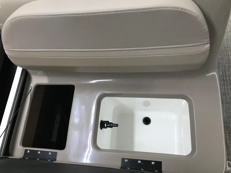 Slide: The Image of 2025 Ranger Reata 200F boat dashboard with steering wheel and gauges. - 21