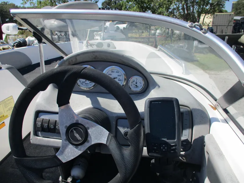 Slide: The Image of 2008 Skeeter 190 SKI FISH SL190 boat dashboard with steering wheel and gauges. - 10