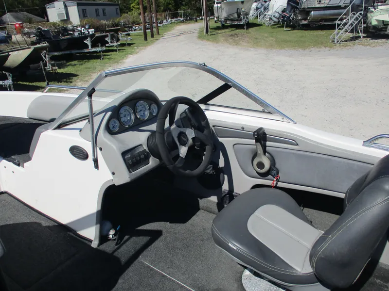 Slide: The Image of 2008 Skeeter 190 SKI FISH SL190 boat interior with steering wheel and dashboard. - 6