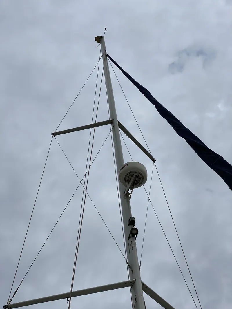 Slide: The Image of Marlow Hunter 40 sailboat mast against cloudy sky, 2014 model. - 15