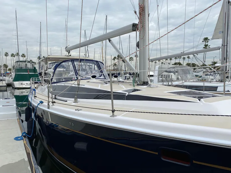 Slide: The Image of 2014 Marlow Hunter 40 sailboat docked in marina, overcast sky. - 16