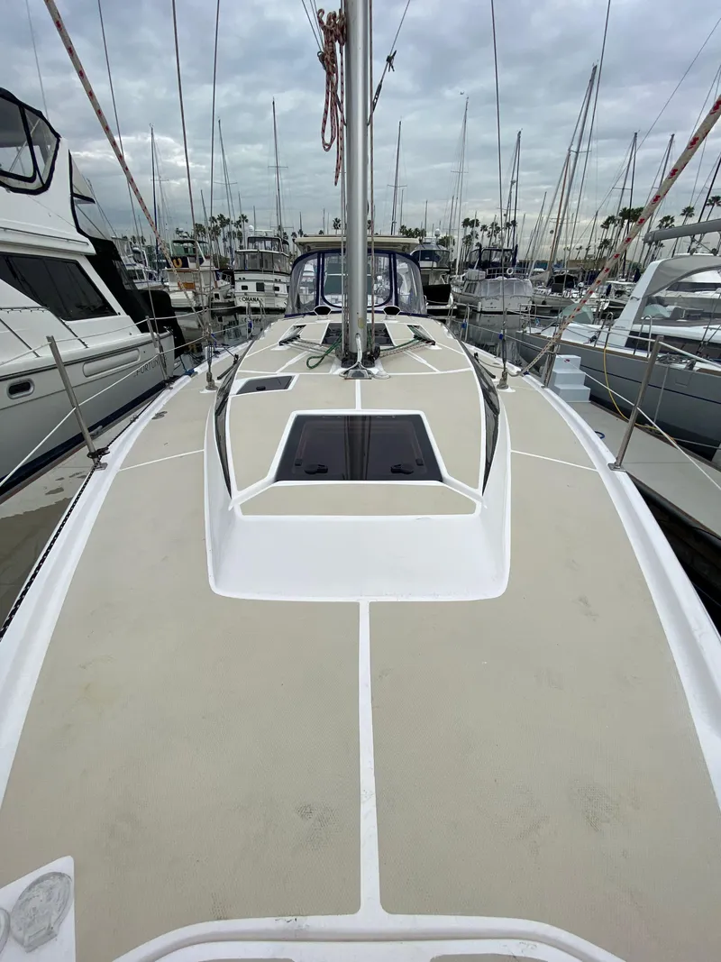 Slide: The Image of 2014 Marlow Hunter 40 sailboat deck view in marina. - 25