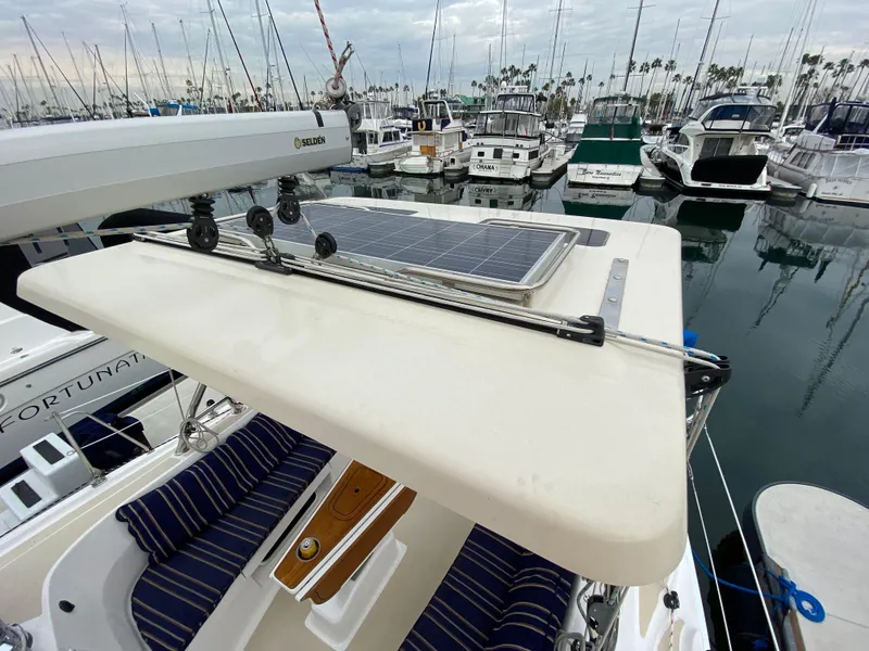 Slide: The Image of 2014 Marlow-Hunter 40 sailboat with solar panel, docked in marina. - 29