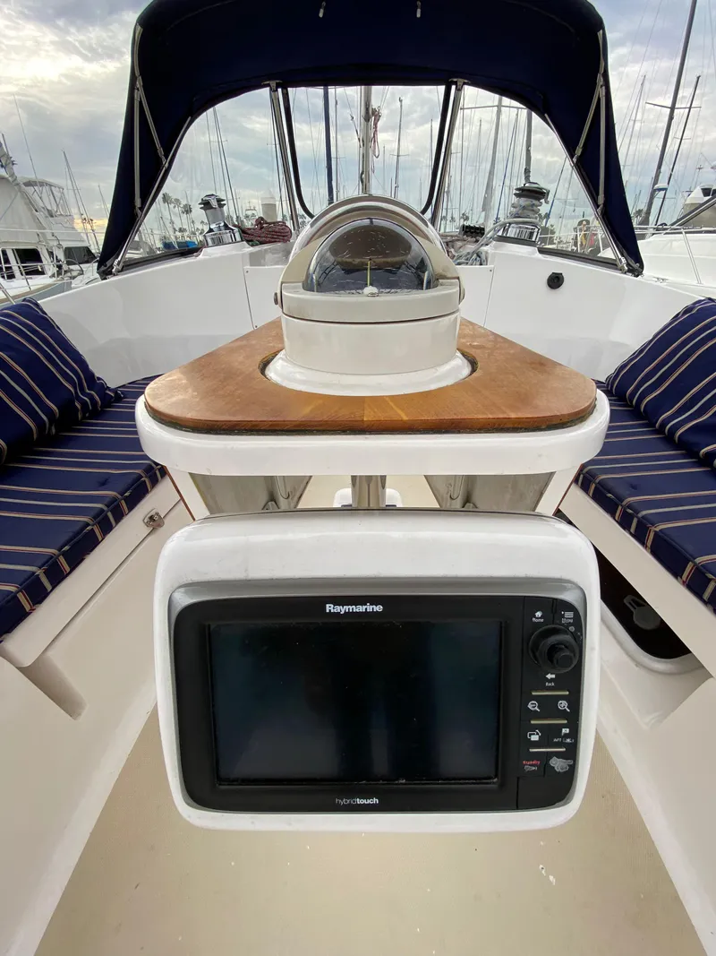 Slide: The Image of 2014 Marlow-Hunter 40 sailboat cockpit with navigation equipment and seating. - 39
