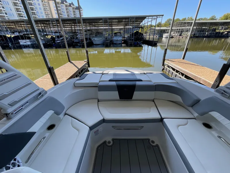 Slide: The Image of 2024 Chaparral 23 SSi boat interior at marina dock. - 4