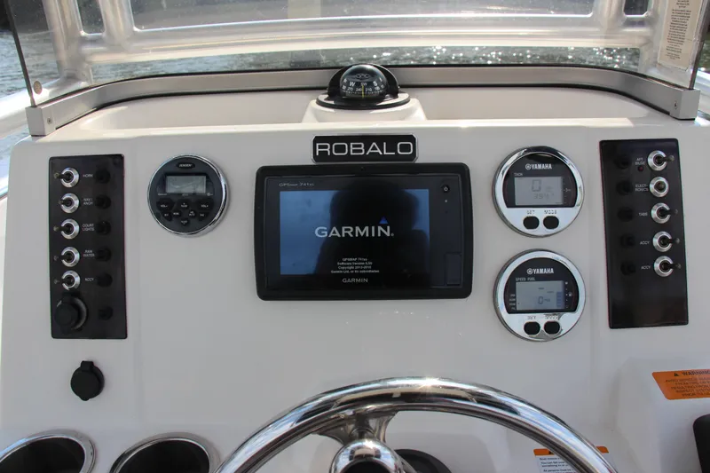 Slide: The Image of Dashboard of 2017 Robalo R200ES boat with Garmin navigation system. - 13