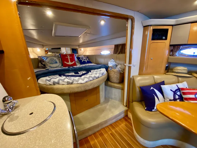 Slide: The Image of Luxurious 2006 Chaparral Signature 350 yacht interior with cozy cabin and nautical decor. - 18