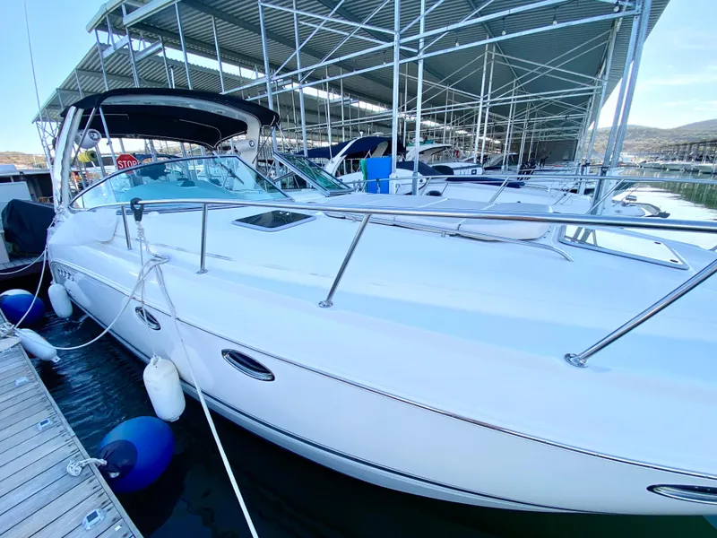 Slide: The Image of 2006 Chaparral Signature 350 yacht docked in marina, side view. - 2