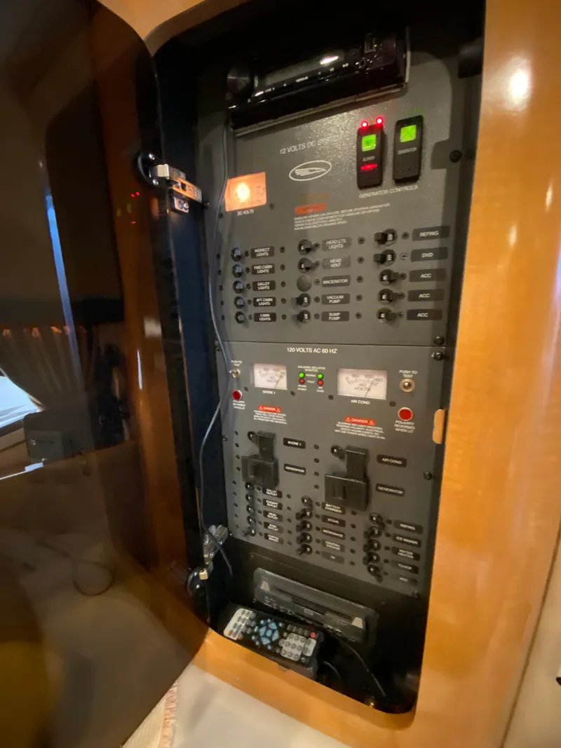 Slide: The Image of Electrical control panel inside 2006 Chaparral Signature 350 boat. - 26
