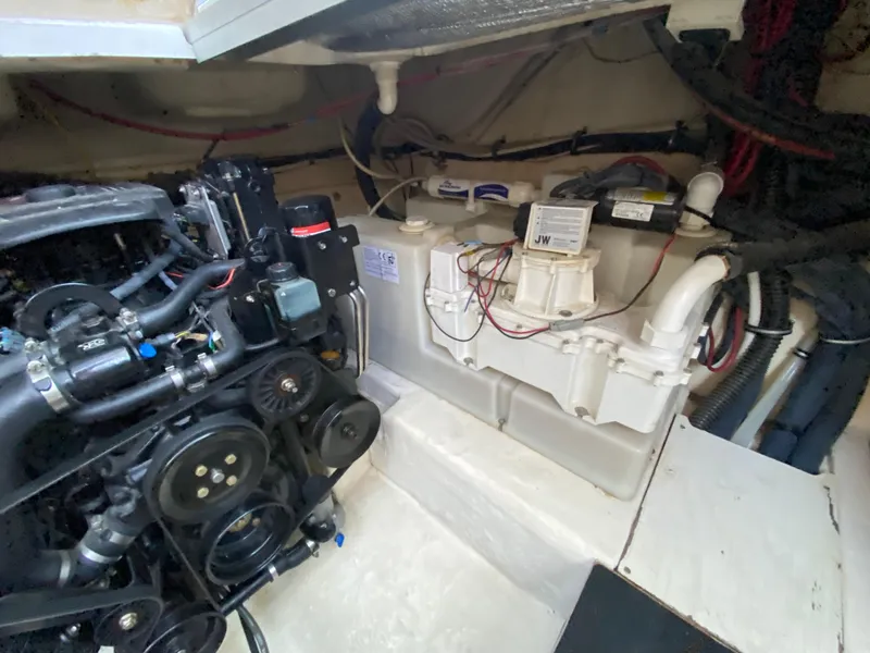 Slide: The Image of Engine compartment of 2006 Chaparral Signature 350 boat, showing mechanical components and wiring. - 37