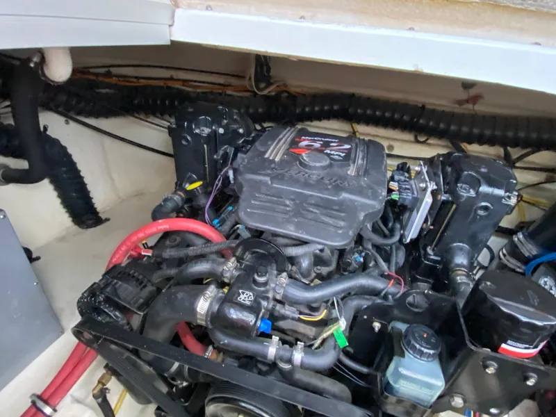 Slide: The Image of Engine compartment of 2006 Chaparral Signature 350 boat, showcasing detailed mechanical components. - 41